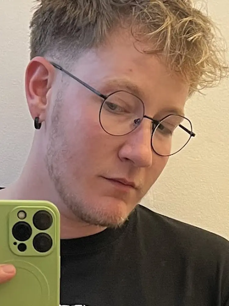 Client with a fresh blonde crop and skin fade